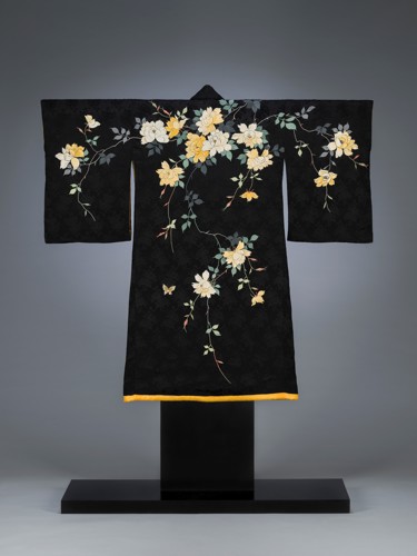 black gown with white and yellow flowers