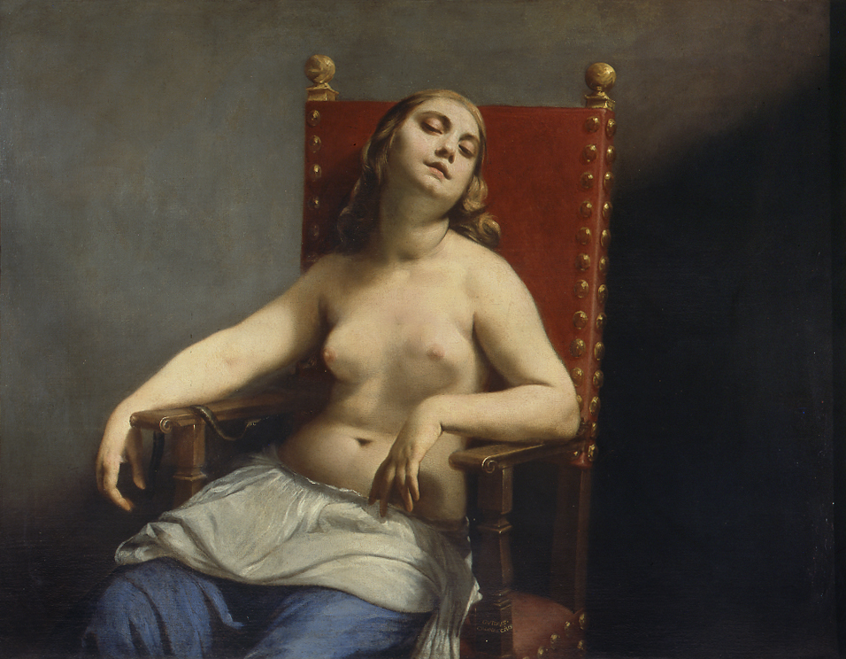 Guido Cagnacci's The Death of Cleopatra, a painting of a topless woman collapsed onto a red, studded leather chair, white her eyes just barely open. A small black snake can be seen coiled around the right arm rest