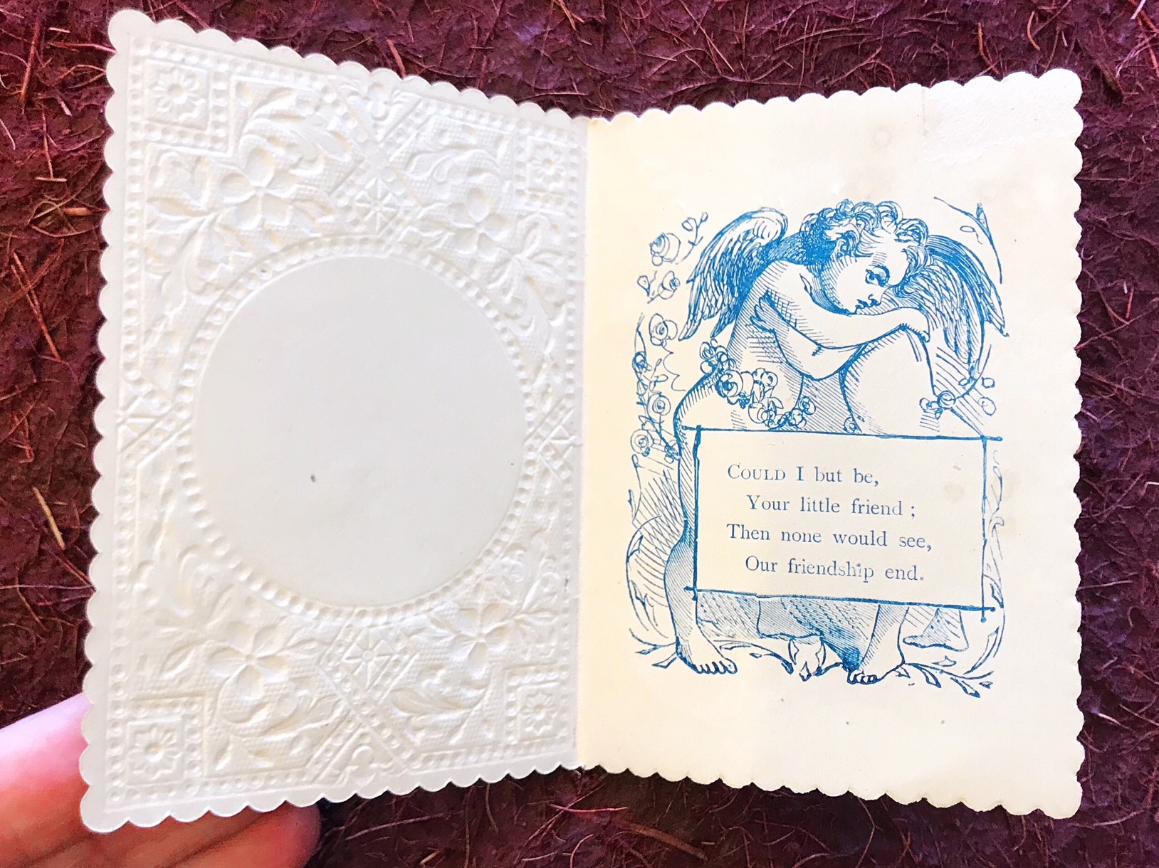 paper lace valentines with drawing of cupids and a poem