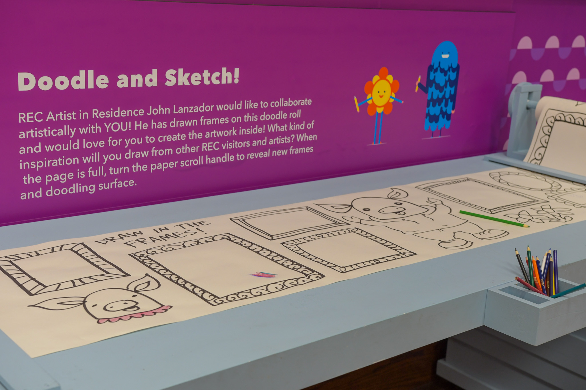 Doodle and sketch art-making table with prompts.