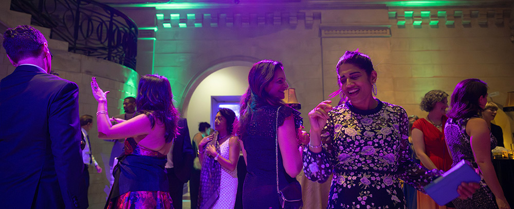 Guests dance and smile in the Great Hall