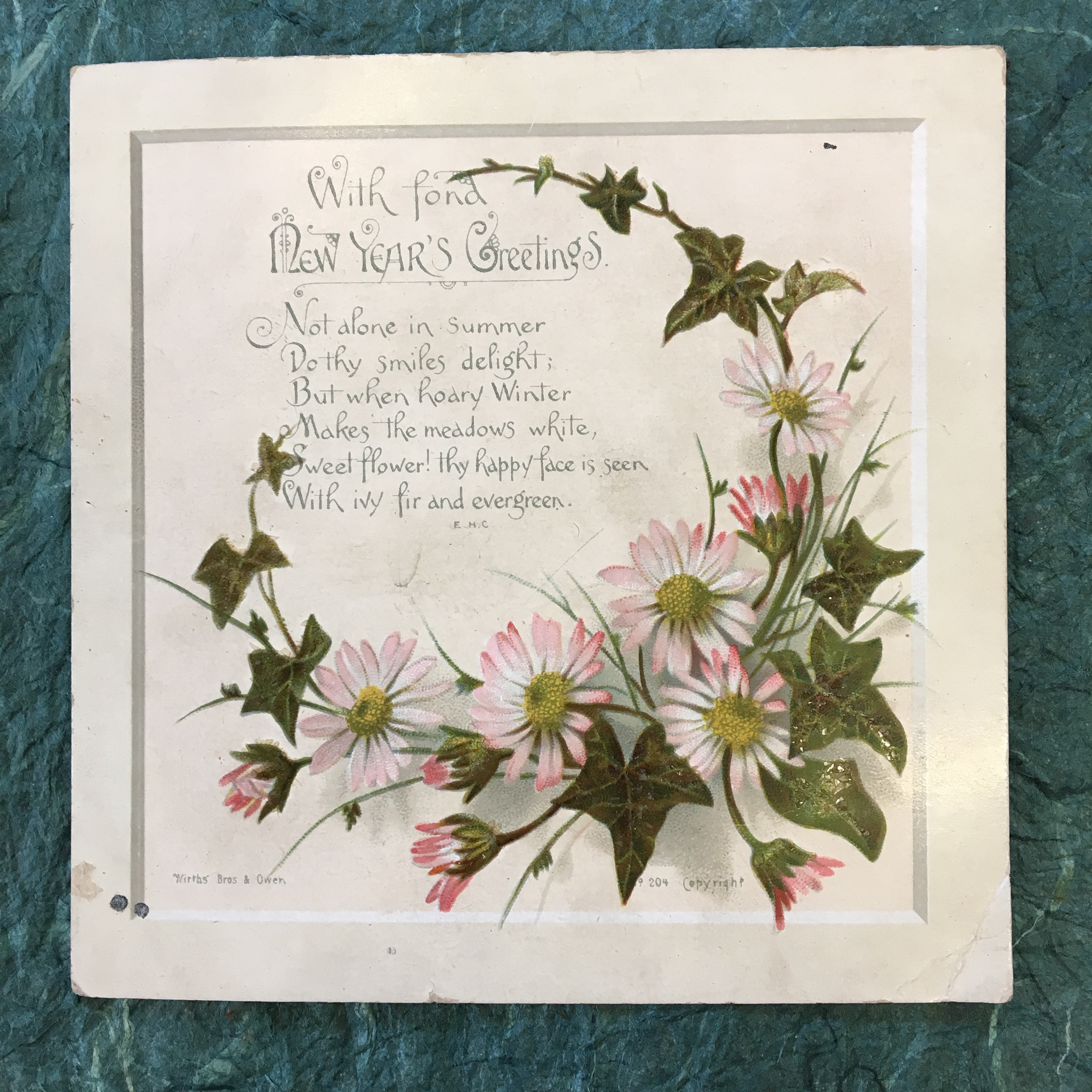 New Years card with a short poem and an illustration of some pink and white flowers