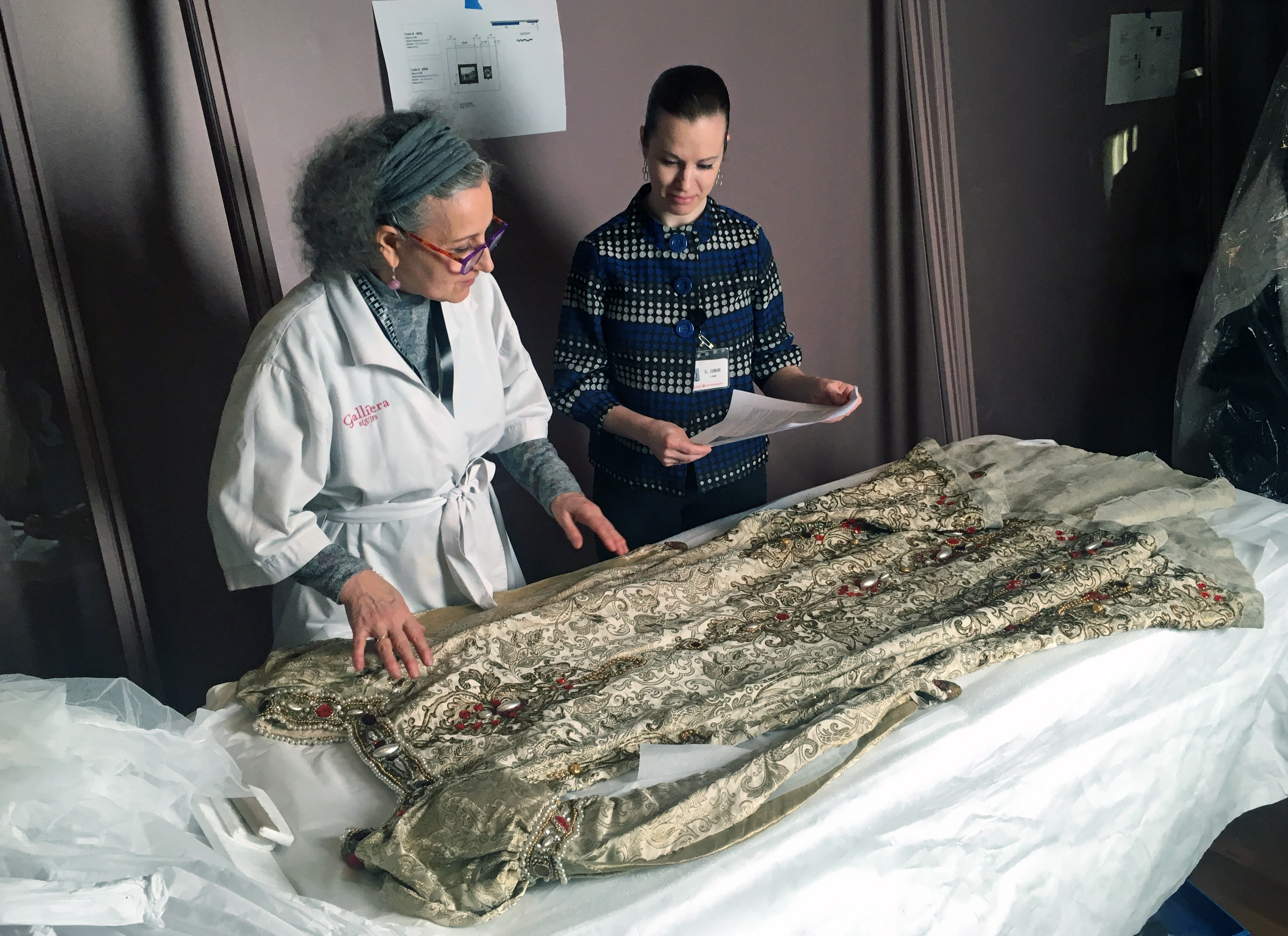 conservation process of an ornate dress