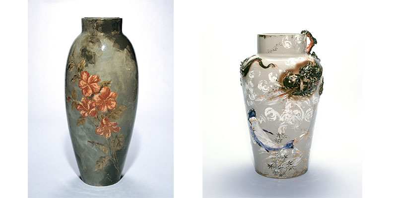 two large vases, one decorated with orange flowers, the other with a Chinese dragon