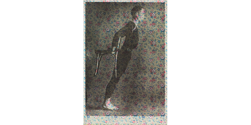 screen print of a boy holding a chair behind his back printed on floral decorated paper