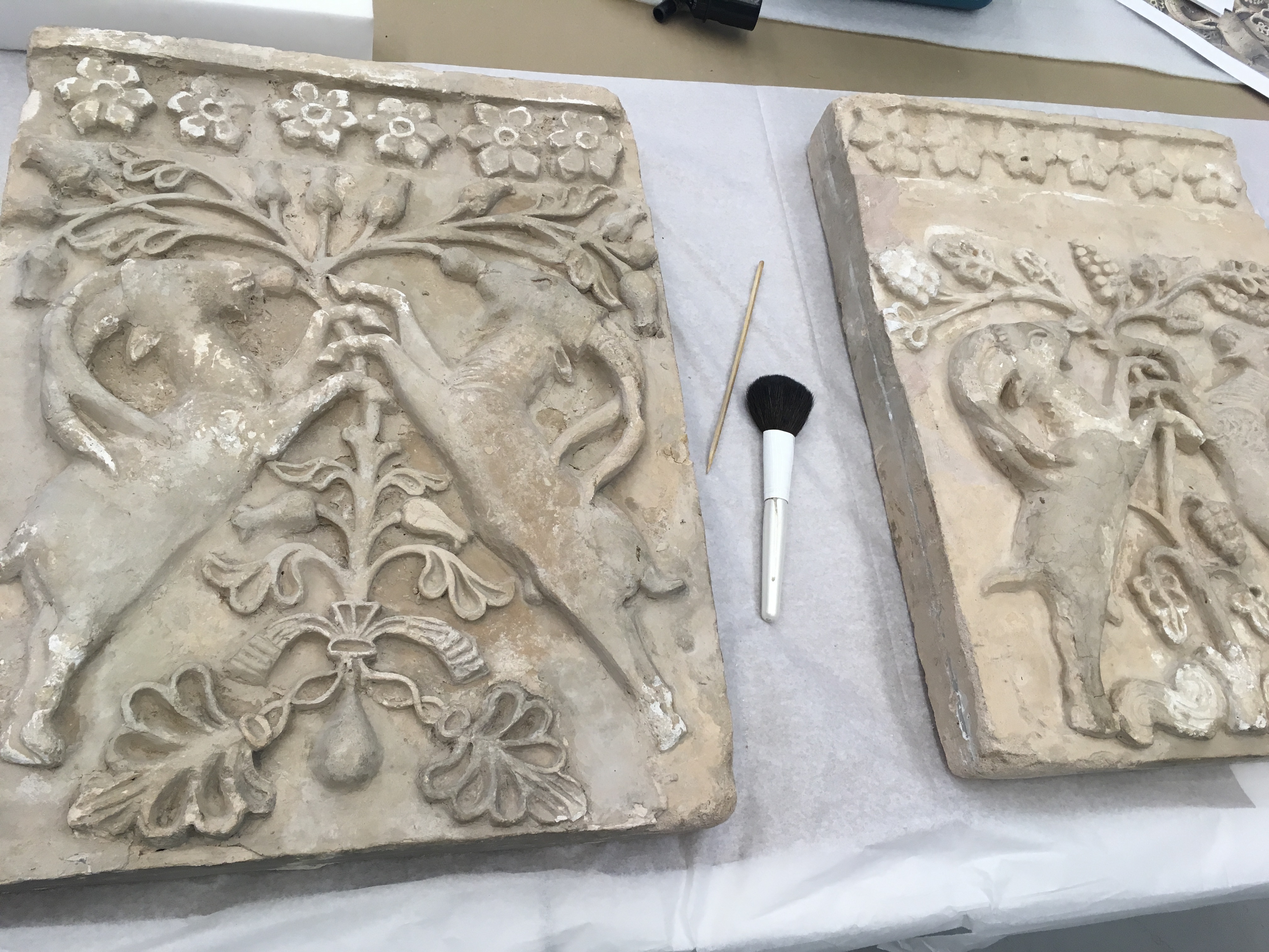 carved stone tablets undergoing treatment