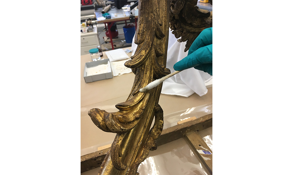 cleaning a gold gilded table leg