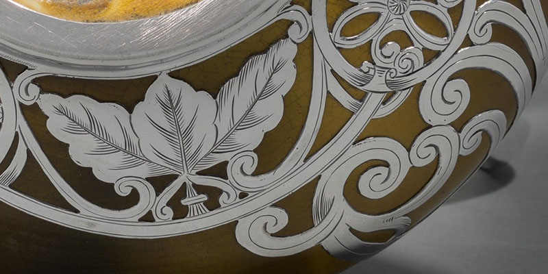 engraved, silver leaves and ornate decoration