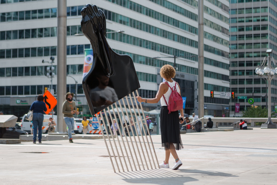 Hank Willis Thomas' All Power to all People, a large sculpture of an afro pick comb embedded in the ground upright
