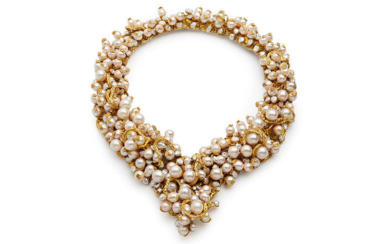 Detail of Barbara Anton's Potpourri of Pearls Necklace, featuring clusters of pearls woven with coarse gold and studded with diamonds.