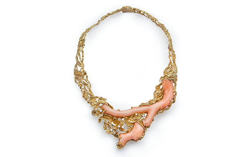 Arthur King's Necklace, large pieces of pink coral and small diamonds encased in course textured gold