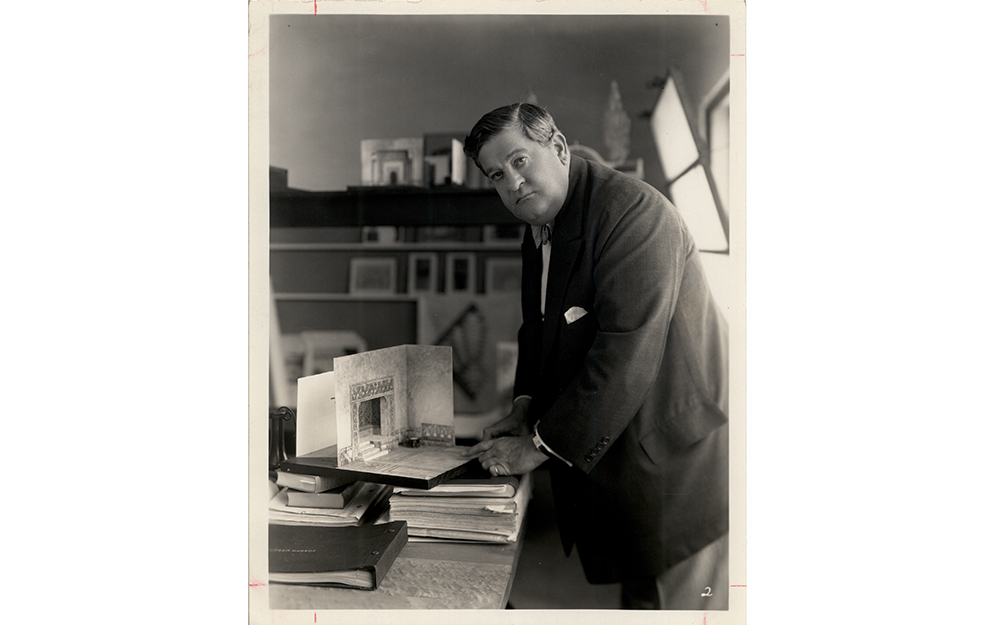 Joseph Urban standing over a model set in his Yonkers Studio, 1927. Joseph Urban Archive, Rare Book & Manuscript Library, Columbia University.