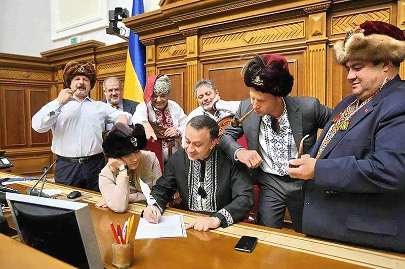 Ukrainian members of Parliament recreating the painting as they pen a response to Vladimir Putin’s essay “Historical Unity of Russians and Ukrainians,” July 2021