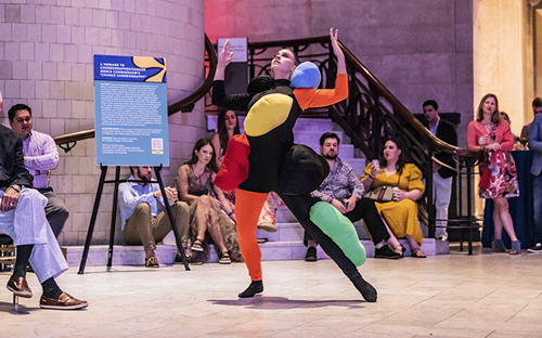 A dancer performs in the Great Hall for A Happening