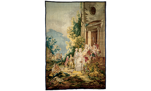 A tapestry featuring a royal scene outside a building
