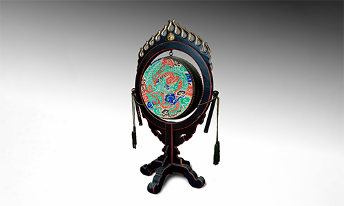 large Japanese drum with black mount and colorful head