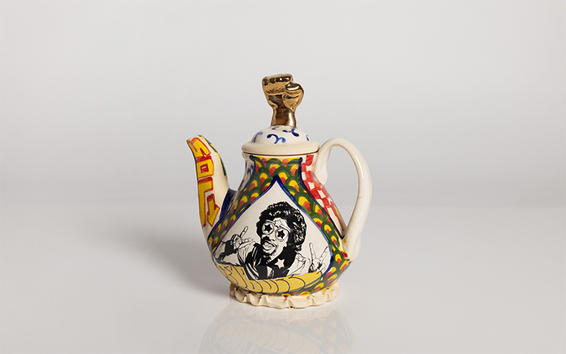 Bootsy Collins and Kathryne Gardette Teapot , 2022, Roberto Lugo (Puerto Rican American, b. 1981), glazed stoneware, luster, Courtesy of the artist . © Roberto Lugo. Photographs by Ashle y Smith, courtesy of the a rtist and R & Company.