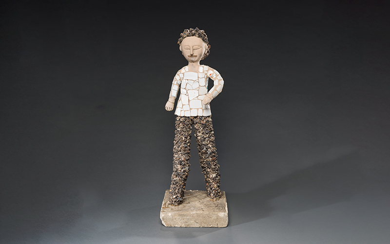Nek Chand (Indian, 1924–2015), Standing Man, circa 1951–80, painted fired clay, broken china, rocks, and concrete, 34 1/2 x 12 x 12 in. (87.6 x 30.5 x 30.5 cm), Collection of Richard Rosenthal © The Nek Chand Foundation