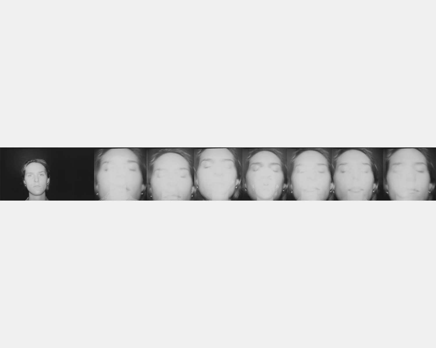 A sequence of black and white photos of a white woman's face
