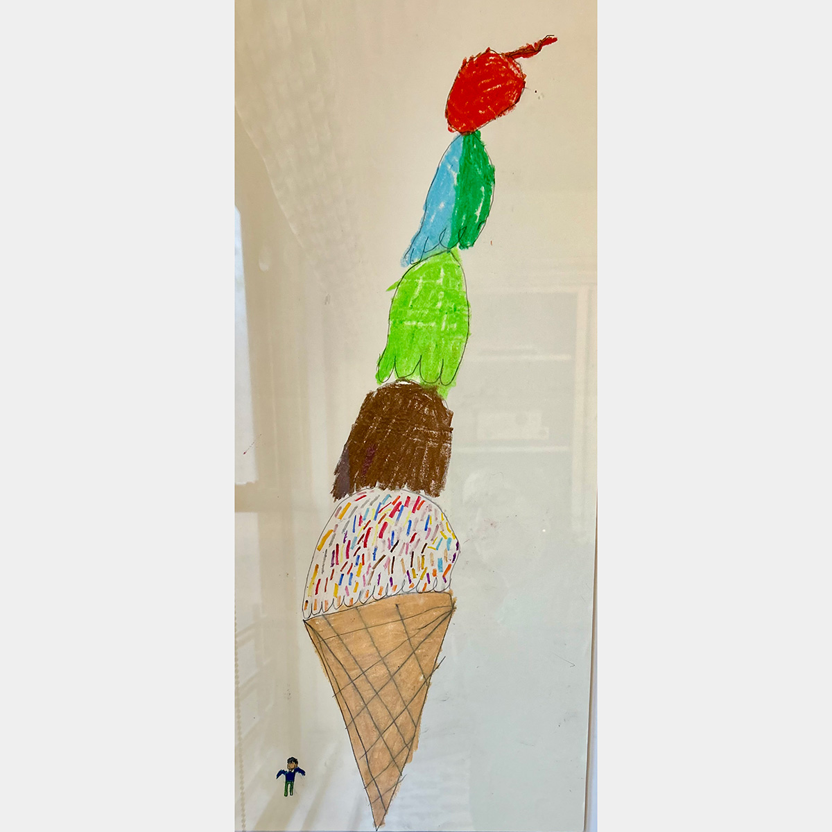 A kid's illustration of a massive ice cream cone towering over a tiny person