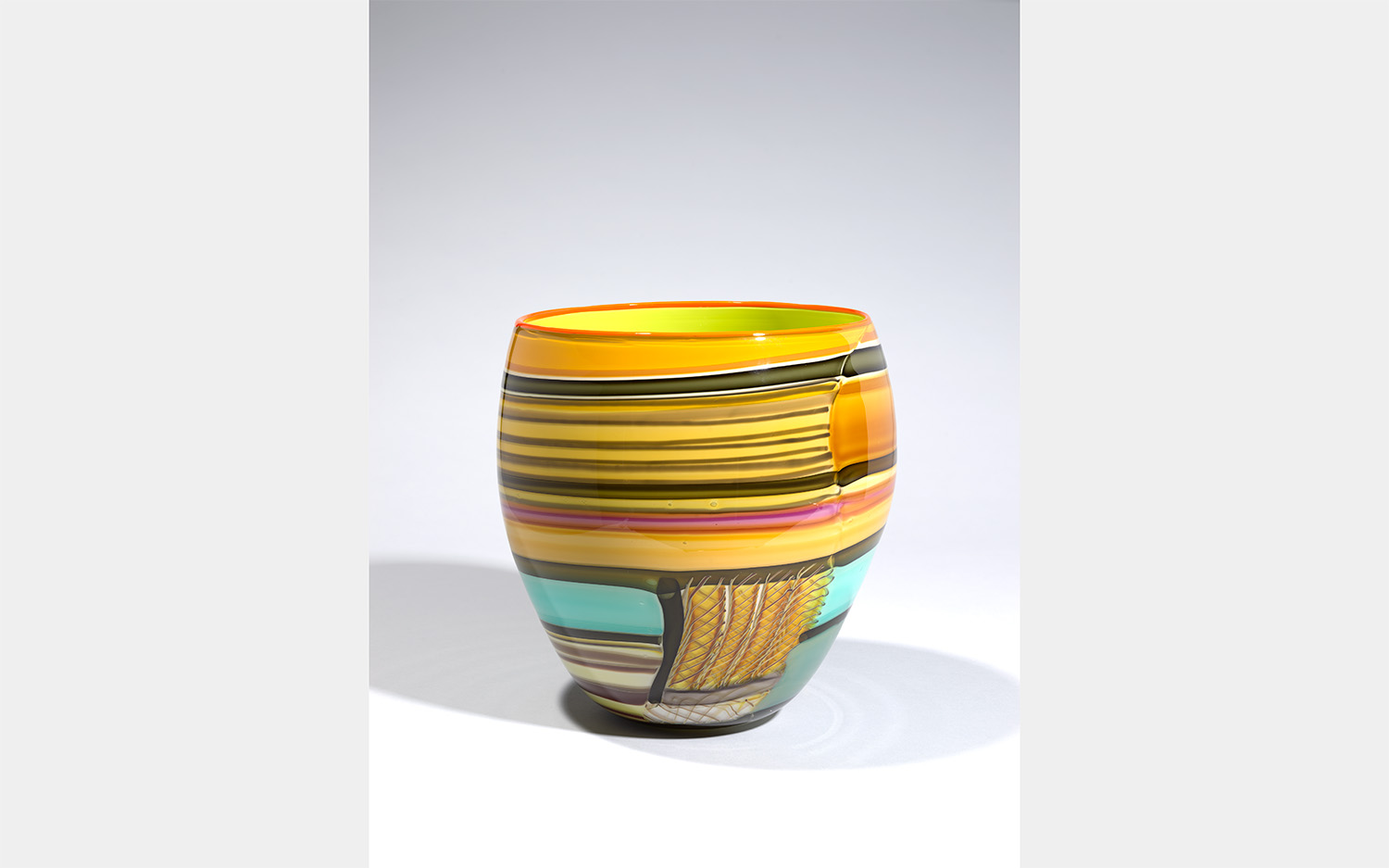 A bright yellow, striped pot