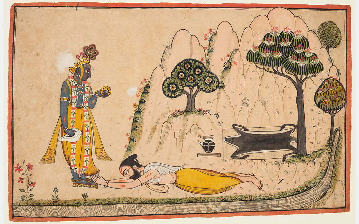 A man lies at the feet of Krishna