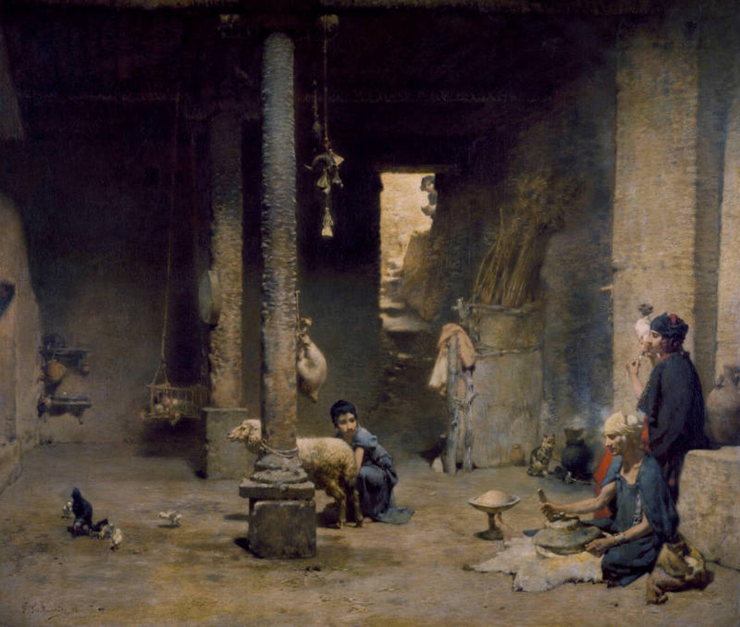 Several people in a large dark room with columns