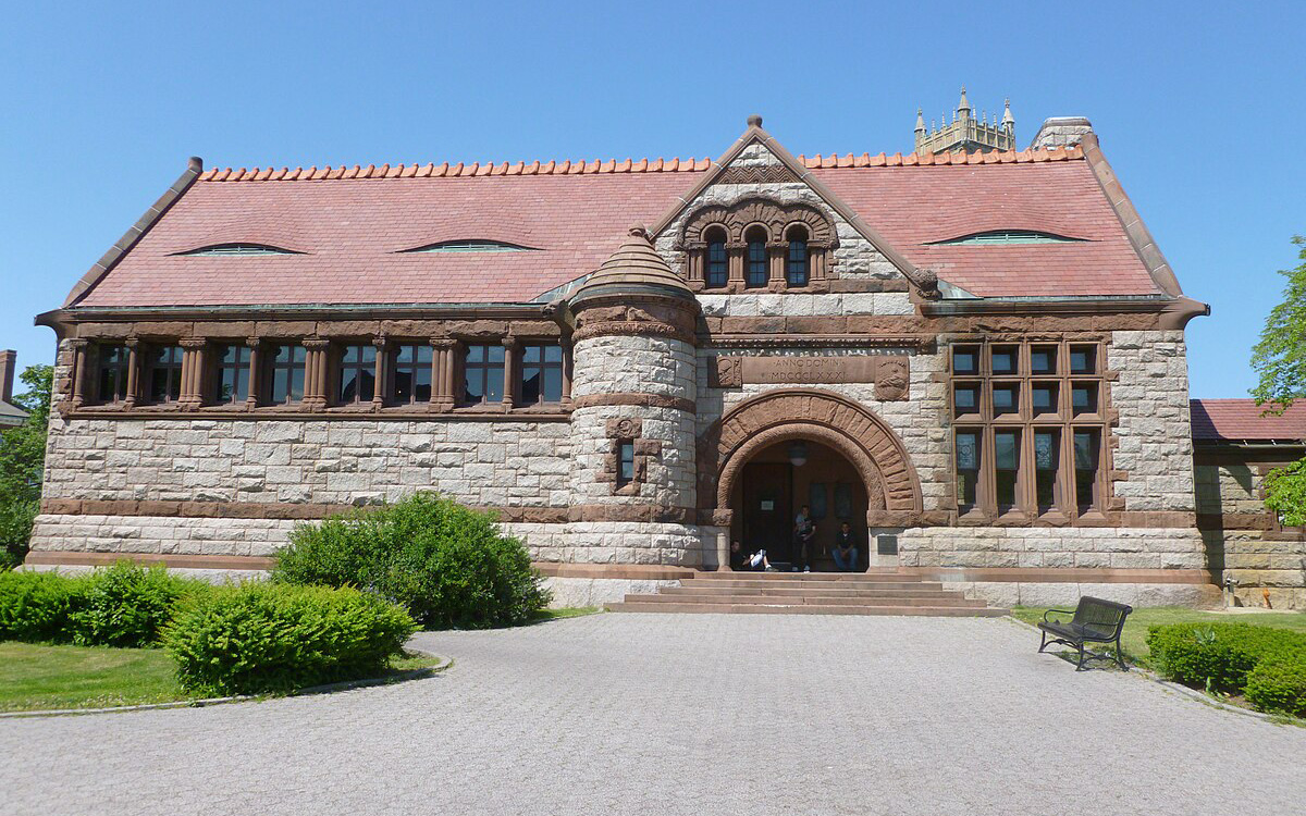 stone building with red tile roof