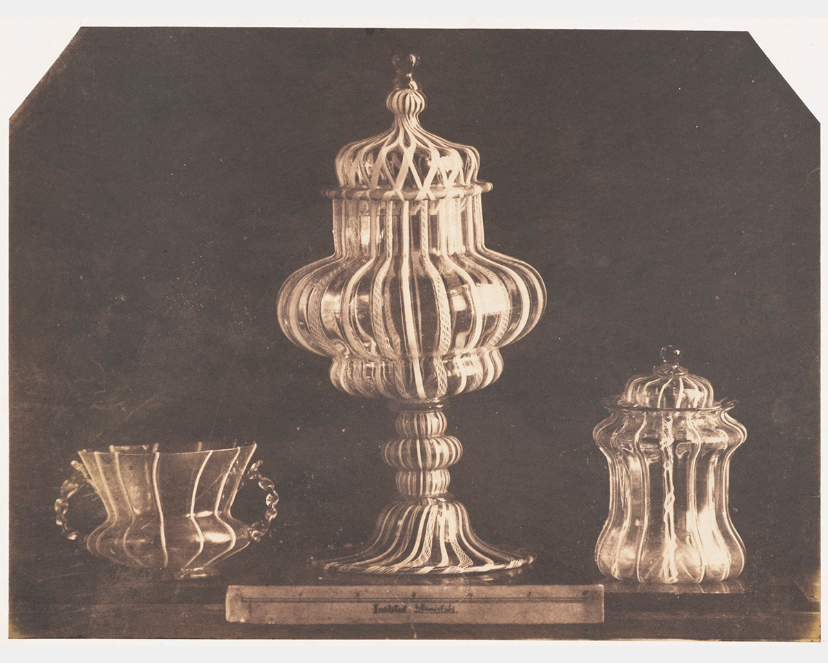 A black and white photo of ornate glass objects