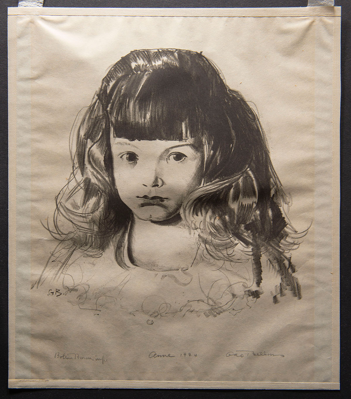 A simple illustration of a young girl. The paper is rumpled.