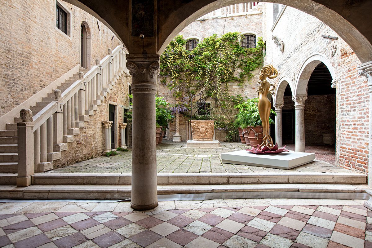 A large Shahzia Sikander sculpture stands in a plaza in Italy