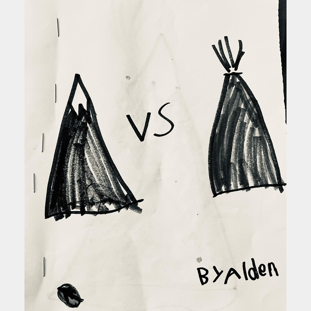 A black and white kids drawing of two mountains